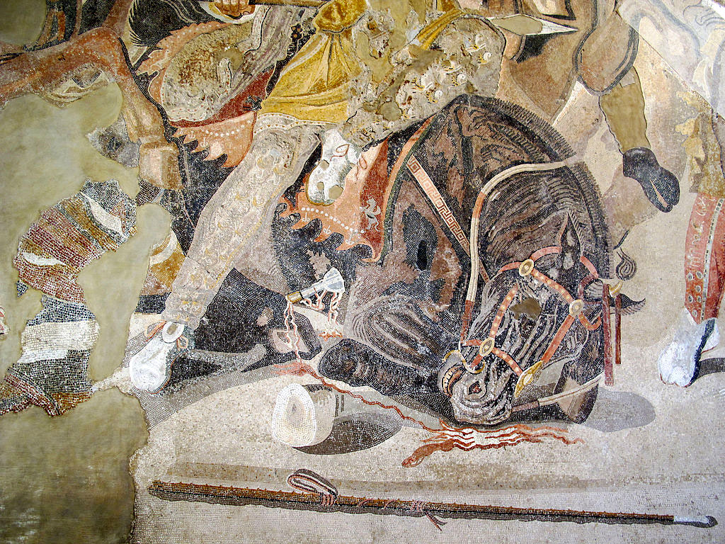 Mosaik: gehörntes Pferd am Boden